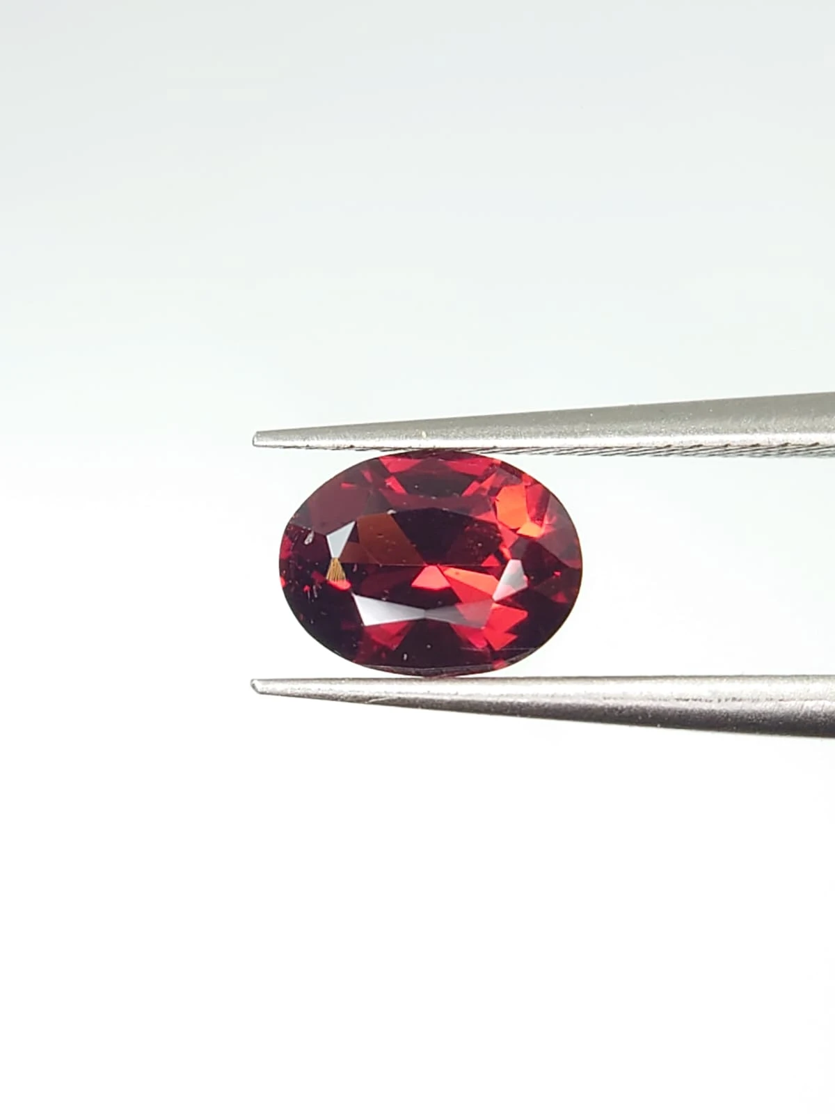 1.56ct Natural Malaya Garnet Oval Cut From Tanzania — view 5